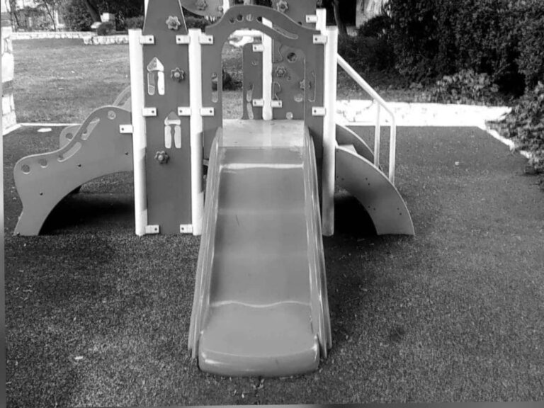 Empty playground slide in a municipal kindergarten in Jerusalem, summer 2025