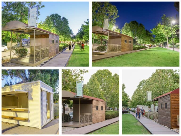 Food trucks and wooden kiosks in Jerusalem's Rail Park, bringing culinary life to the green urban space