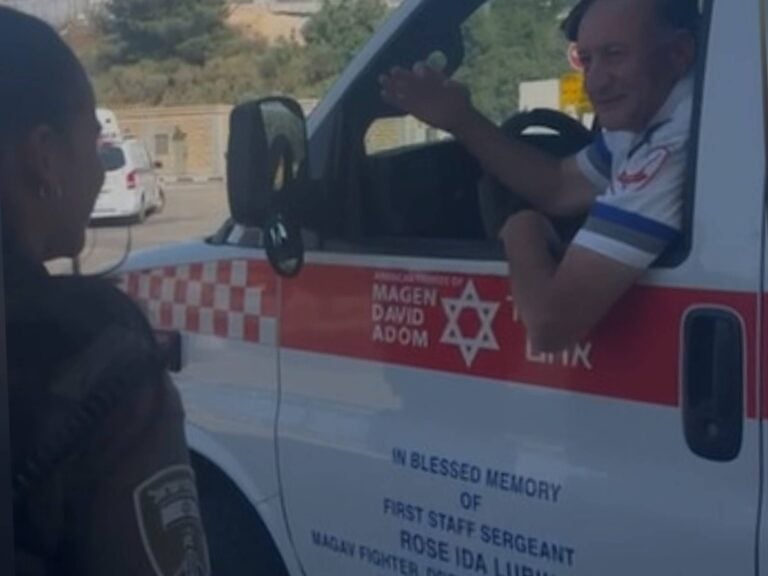 Border Police officer and MDA medic after emergency twin birth at Jerusalem Tunnel Crossing
