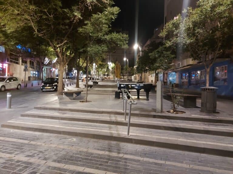 Jerusalem’s Hillel Street at night – empty, with bars and fast-food stands facing collapse amid wartime quiet
