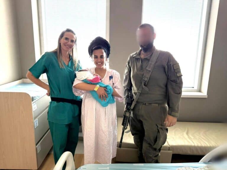 An Israeli soldier with his wife and newborn baby at Hadassah hospital, during national emergency and Iran strike
