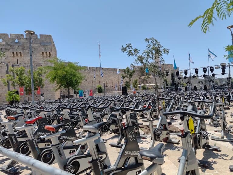 Empty spinning bikes set up near Jerusalem’s Old City walls during emergency lockdown