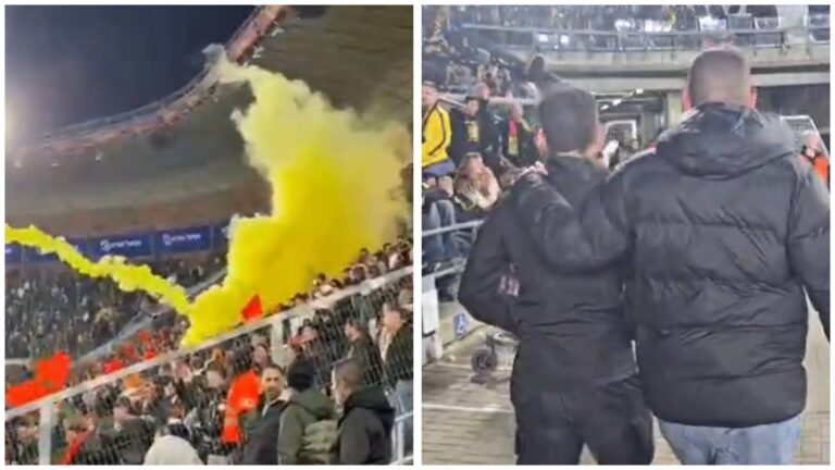 שוטרים עוצרים אוהד ביציעי אצטדיון טדי בירושלים לאחר השלכת רימון עשן במהלך משחק בין בית"ר ירושלים לבני יהודה