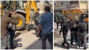 כוחות משטרה וכלי הנדסי כבד במהלך עבודות הריסה בשכונת אל-בוסתאן בסילוואן בירושלים