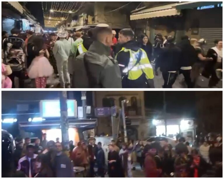 שוטרים מתמודדים עם אלפי חוגגים שהתקהלו במרכז ירושלים במהלך אזעקות