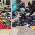 שוטר חושף שקיות סמים מתיק משלוחים של רוכב אופניים שנעצר בחשד לסחר בסמים במרכז ירושלים