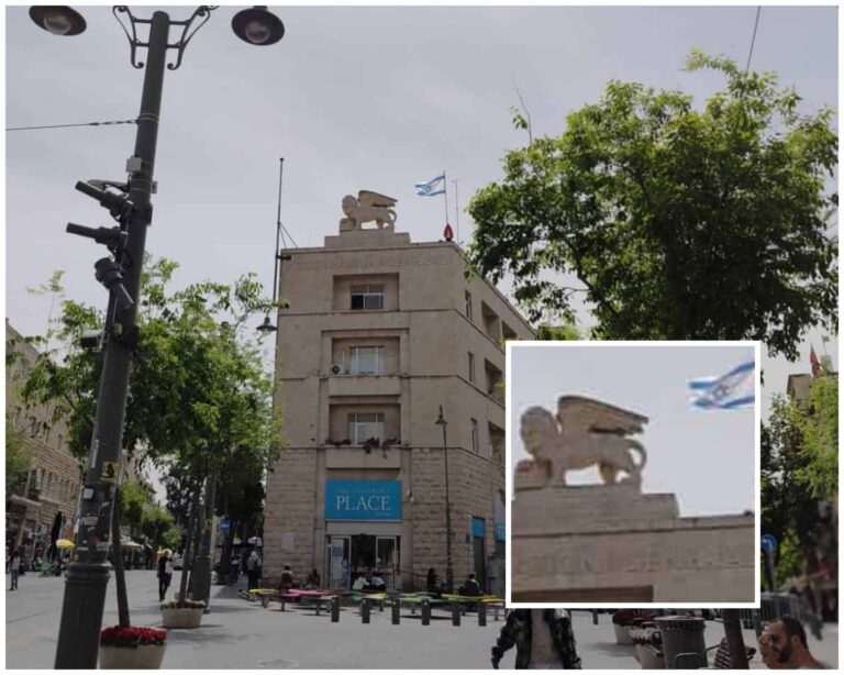 Lion statue on a landmark building in central Jerusalem above Jaffa Street during light rail construction