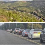 רכבים נעצרים בצד הדרך באזור שער הגיא בכביש לירושלים בזמן אזעקה ואנשים מחפשים מחסה