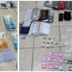 packaged drugs knives cash and mobile phones seized during police operation in Jerusalem